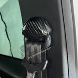 Carbon fiber seat belt fastening cover