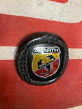 Carbon cover with Grande Punto Abarth emblem