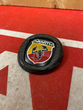 Carbon cover with Grande Punto Abarth emblem